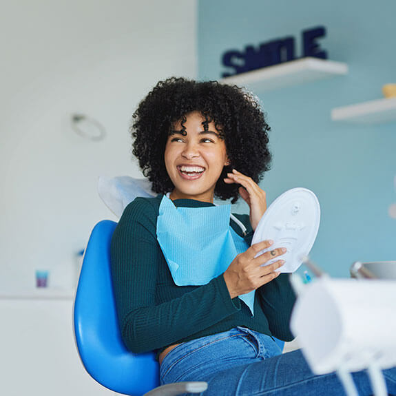 happy-young-woman-at-dental-exam