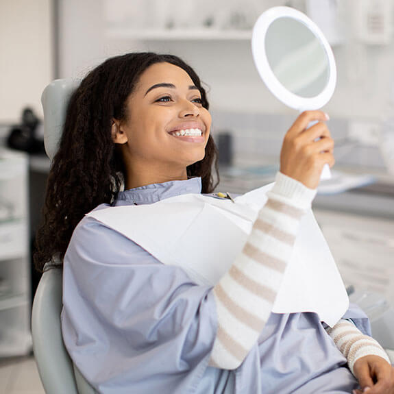 young-woman-checking-her-smile
